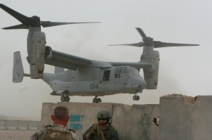 IMG_5161 The Marine Osprey aircraft can fly like helicopter or a fixed-wing. That's BG Nicholson, back to us, in the foreground.