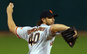 Oct 11, 2014; St. Louis, MO, USA; San Francisco Giants starting pitcher Madison Bumgarner throws a pitch against the St. Louis Cardinals in the first inning during game one of the 2014 NLCS playoff baseball game against the St. Louis Cardinals at Busch Stadium. Mandatory Credit: Dilip Vishwanat/Pool Photo via USA TODAY Sports